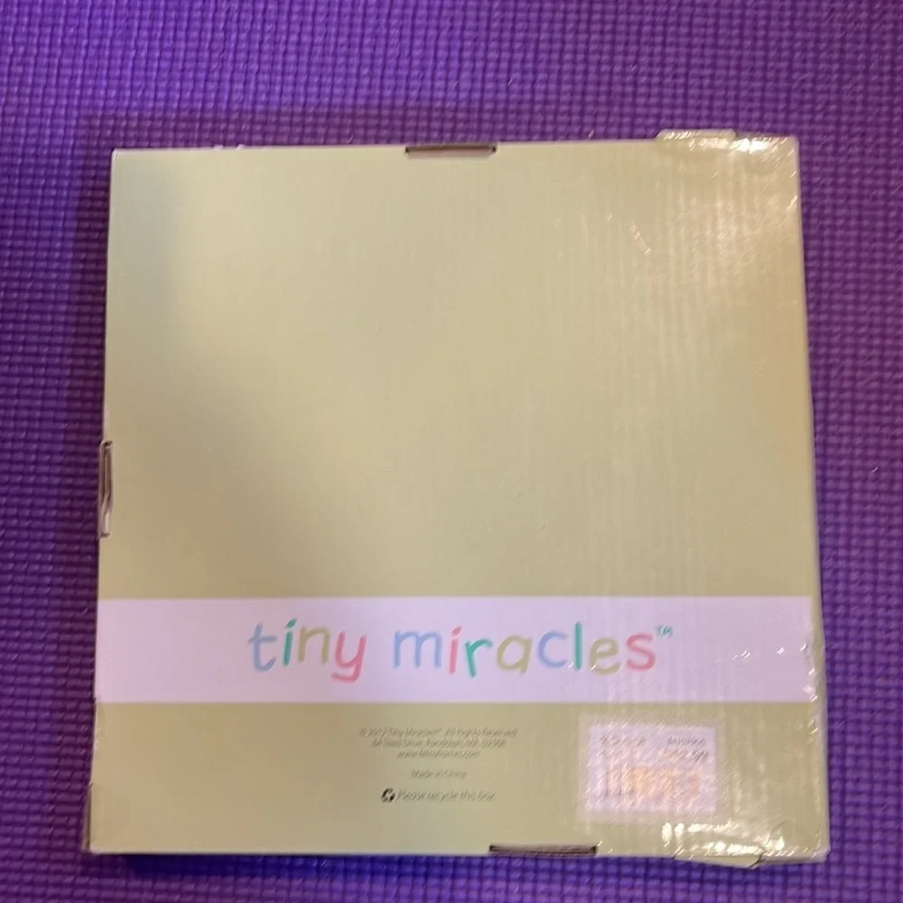 Picture frame.  Holds 5 x 5 photo. Brand new.